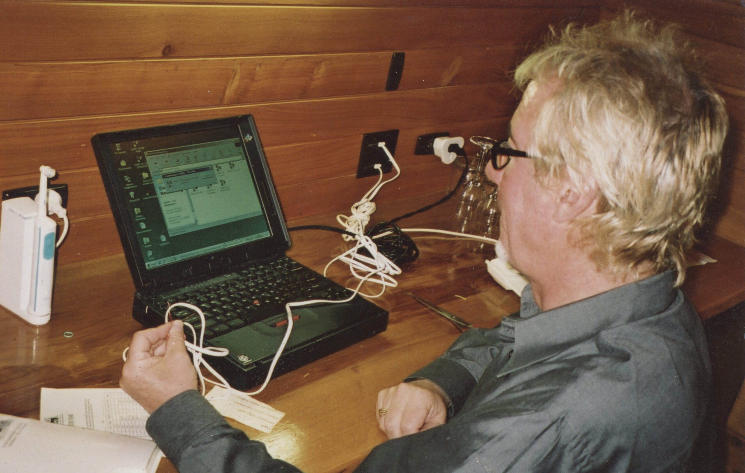 2000: In the Powderhorn Chateau, Ohakune, New Zealand, holding together the wires that connect us to the world.